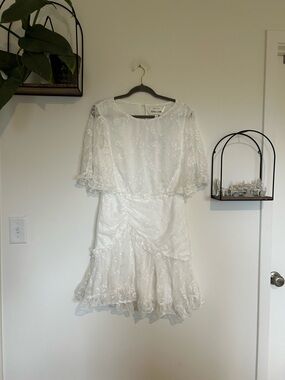 Selfie Leslie | Dresses | Selfie Leslie Eyes On You Pleated Bust Angel Sleeve  Ruffle Hem Dress White | Poshmark